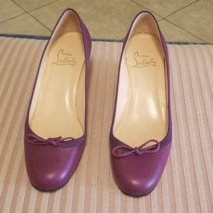Authentic Christian Louboutin raised heel shoe